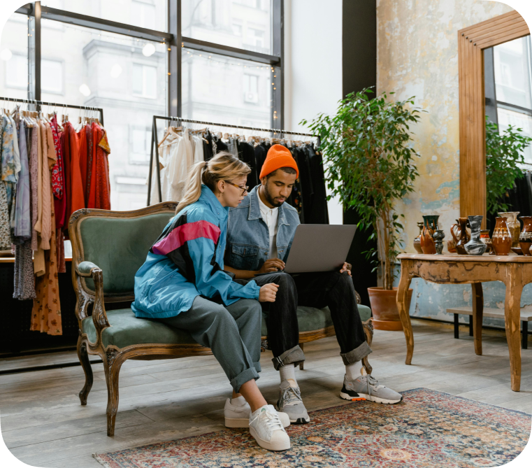 A man and a woman in a retail store exploring the possibilities of AI for retail.