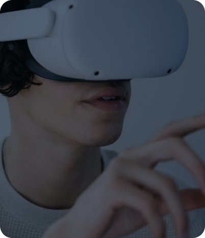 A man using VR glasses as a part of modern customer experience enhancement approaches.